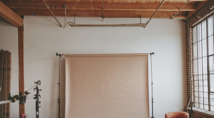 Beige backdrop at a cool industrial photography studio